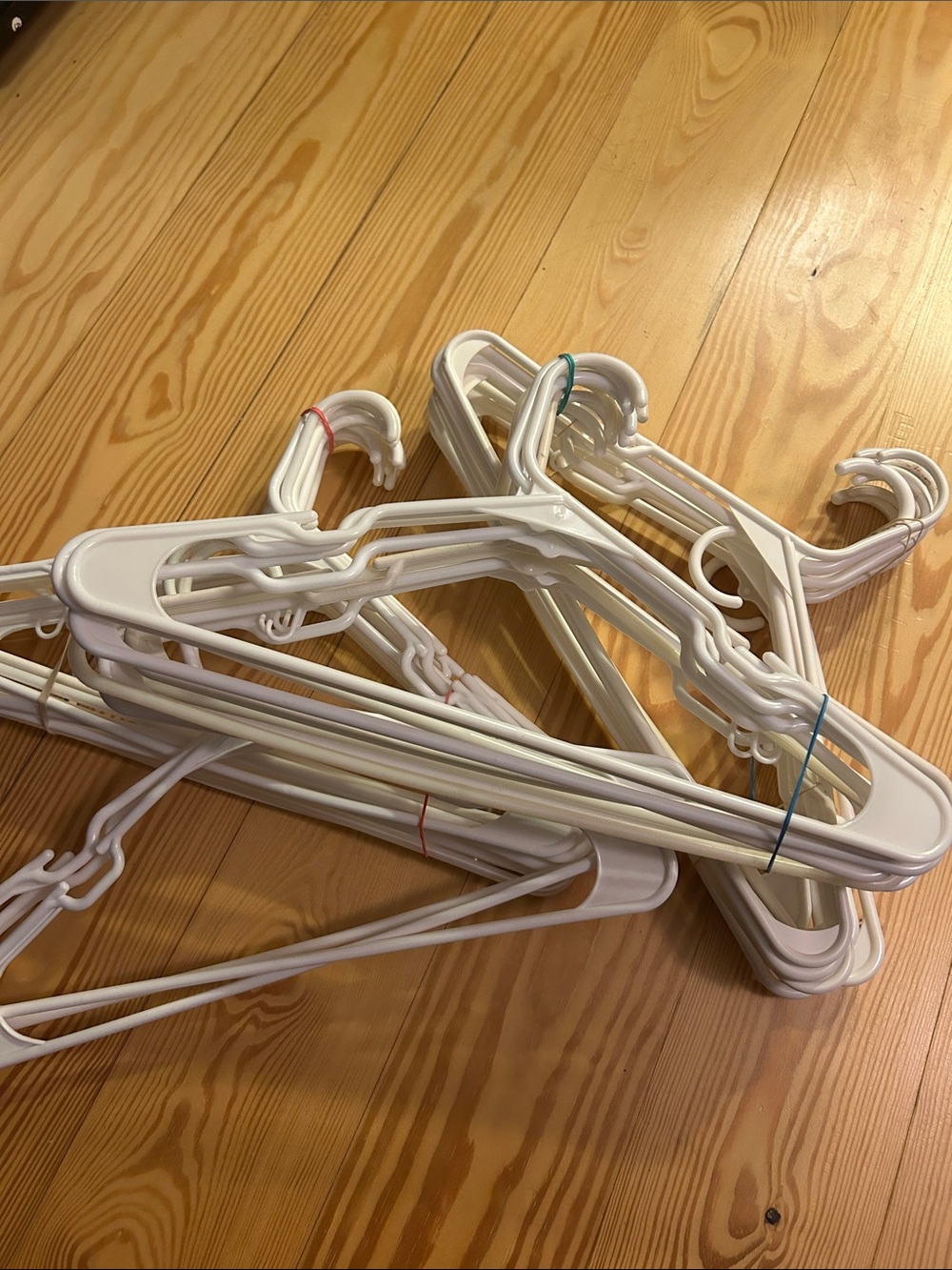 30 white plastic hangers bundle